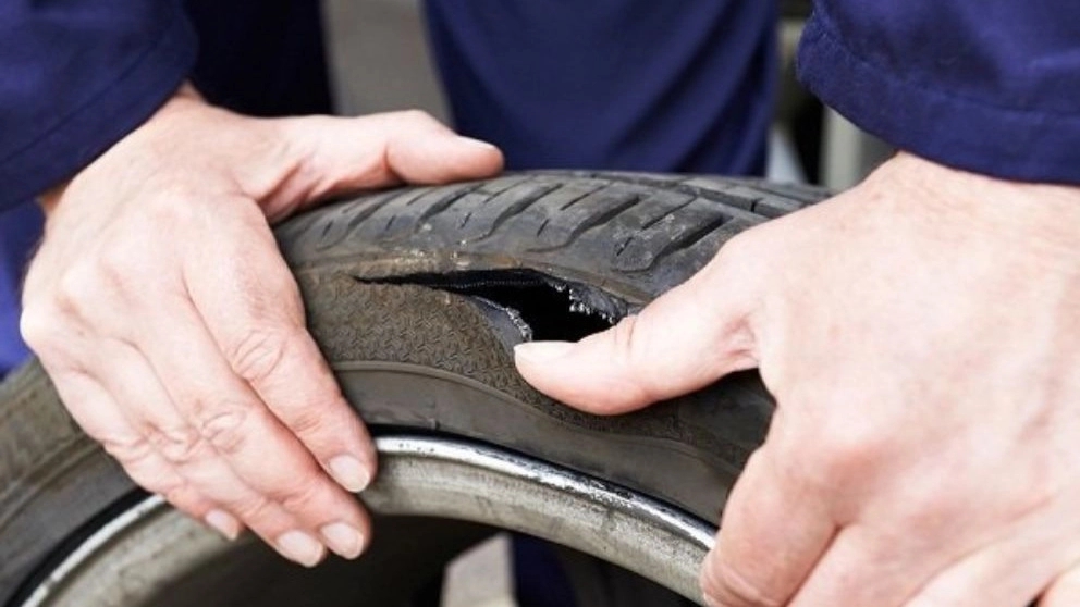 What is the difference between a punctured tire and a flat tire?